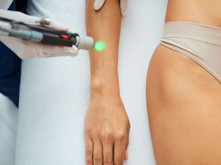 Woman undergoing a laser epilation in a beauty parlor