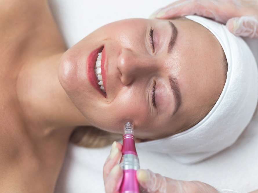 Woman having facial treatment in beauty salon, closeup. Oxy derma therapy